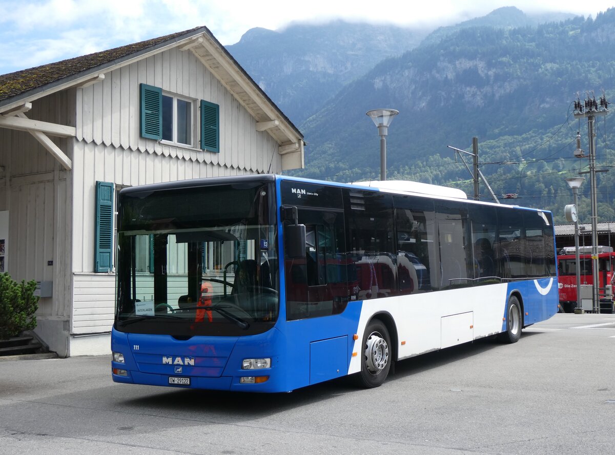 (265'993) - Koch, Giswil - Nr. 111/OW 29'122 - MAN (ex TPN Nyon Nr. 111) am 19. August 2024 beim Bahnhof Meiringen