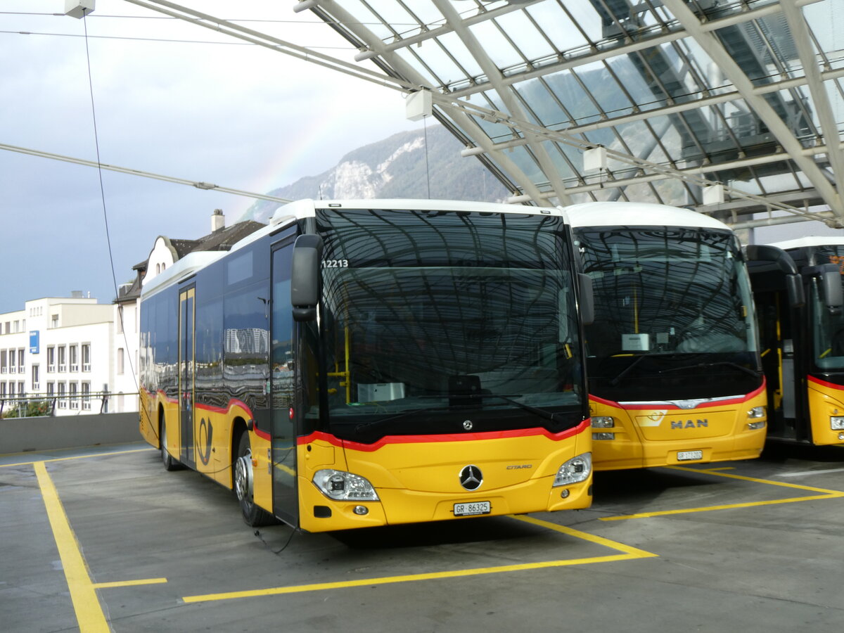 (267'840) - PostAuto Graubnden - GR 86'325/PID 12'213 - Mercedes am 8. Oktober 2024 in Chur, Postautostation