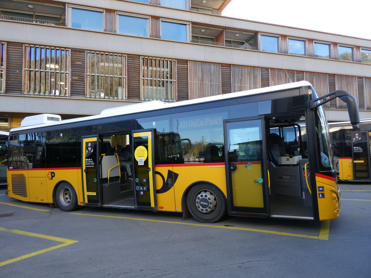 (268'832) - PostAuto Graubnden - GR 102'306/PID 12'012 - Iveco (ex Nr. 6) am 29. Oktober 2024 beim Bahnhof Ilanz