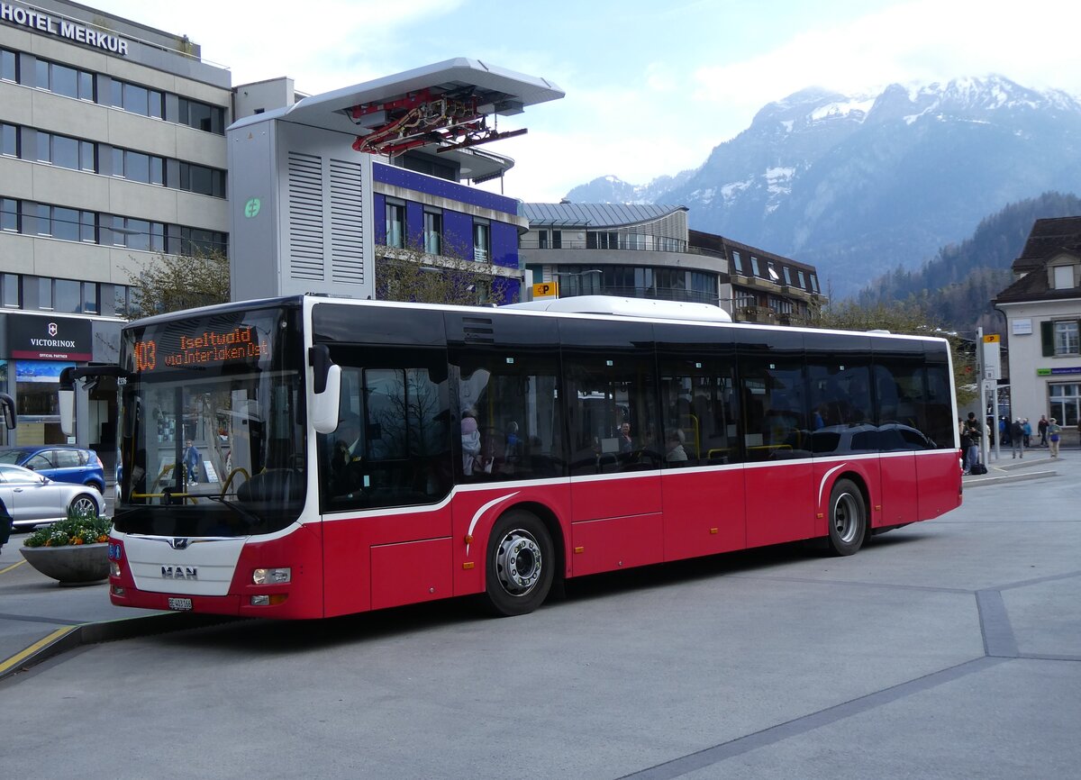 (273'310) - PostAuto Bern - BE 403'166/PID 12'336 - MAN (ex Dr. Richard, A-Wien Nr. 1411) am 28. Mrz 2025 beim Bahnhof Interlaken West