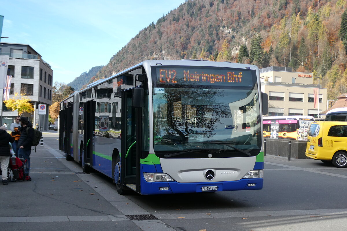 (282'100) - PostAuto Nordschweiz - BL 154'229/PID 12'420 - Mercedes (ex TPL Lugano Nr. 404) am 7. November 2025 beim Bahnhof Interlaken Ost