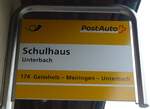 (183'536) - PostAuto-Haltestellenschild - Unterbach, Schulhaus - am 19.