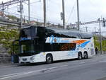(274'203) - Joly Voyages, Les Breuleux - NE 132'019 - VDL am 26. April 2025 beim Bahnhof Neuchtel
