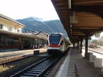 524 102 der TILO als RE Erstfeld - Lugano in Airolo.