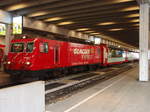 Eine HGe 4/4 II der Matterhorn-Gotthard-Bahn als Glacier Express aus St.